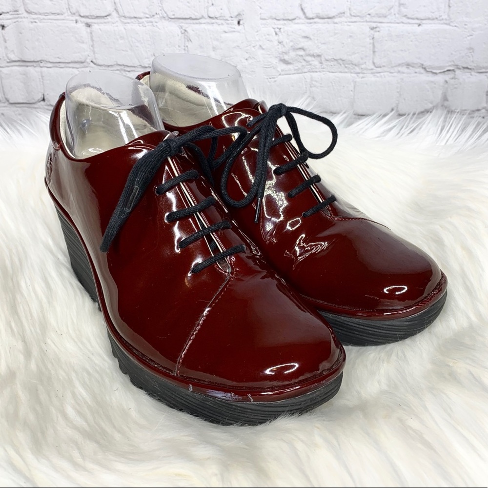 Fly London Patent Leather Wedge Ankle Booties